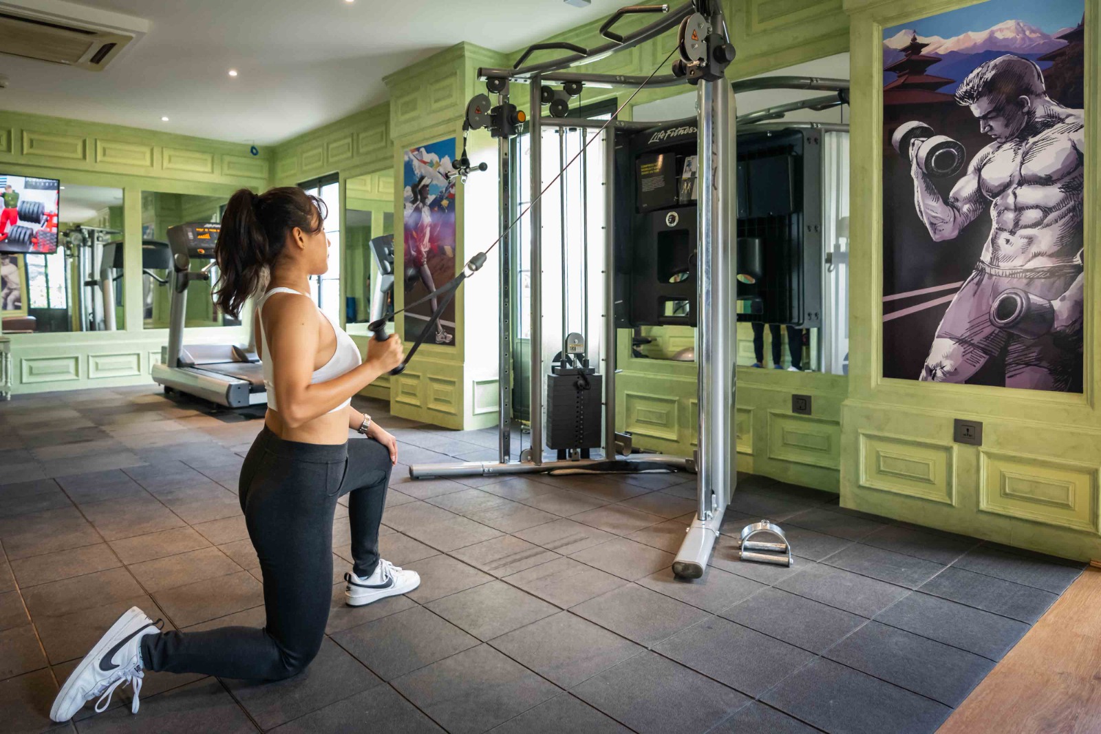 A guest training on the cable machine at the Vyayam Fitness Centre