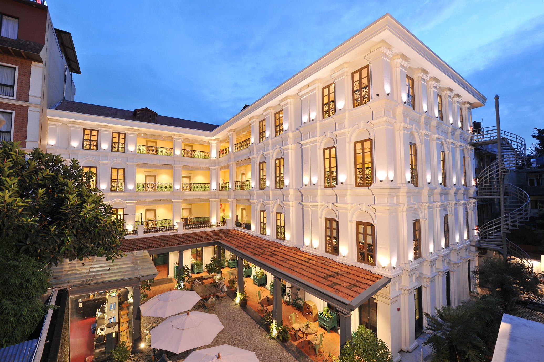 The white house at dusk at Nepali Ghar Hotel